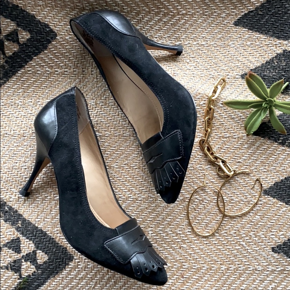 Black leather pumps.